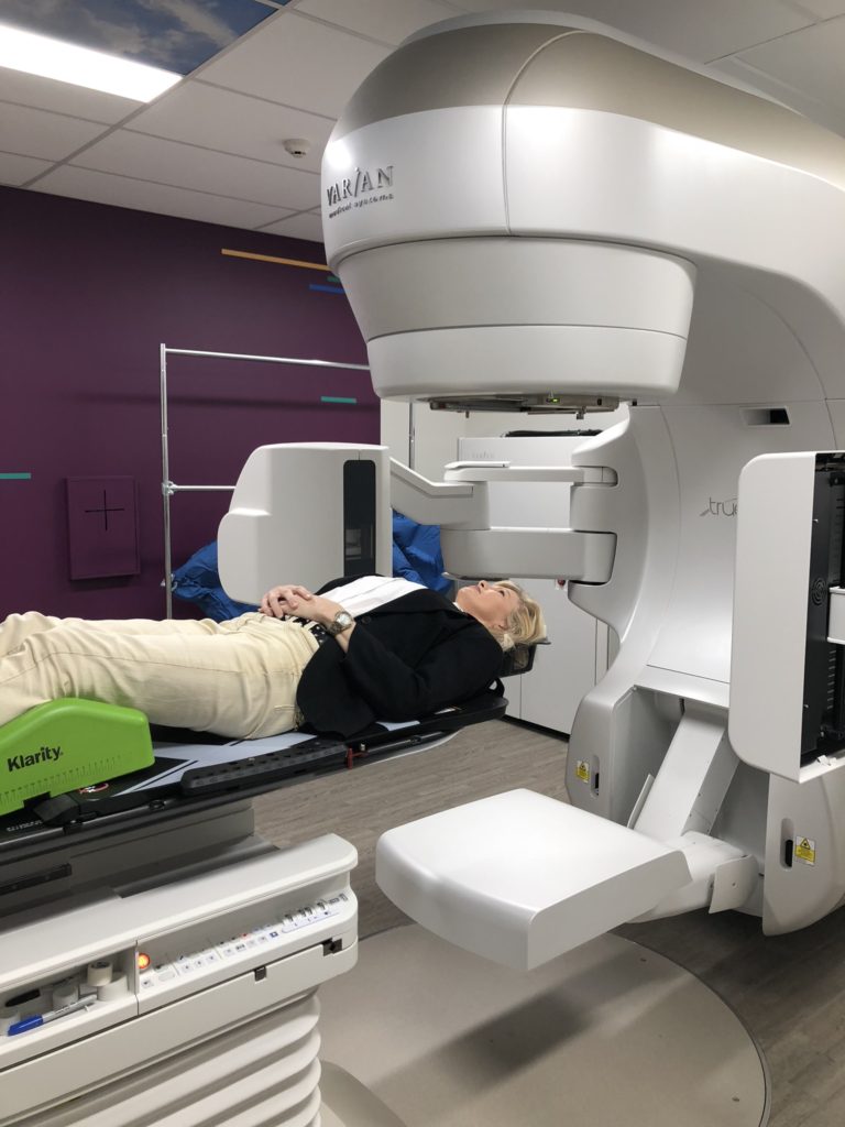 Varian TrueBeam Linear Accelerator With Patient Being Treated With